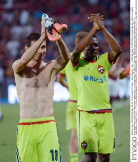 Alan Dzagoev, left, and Ahmed Musa of CSKA Moscow greet the fans after winning the third qualifying round of the Champions League return match between AC Sparta Prague and CSKA Moscow in Prague, Czech Republic, on Wednesday, August 5, 2015. (CTKxPhoto MichalxDolezal) CTKPhotoP201508050850301  dol 012
