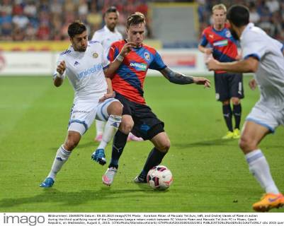 Avraham Rikan of Maccabi Tel Aviv, left, and Ondrej Vanek of Plzen in action during the third qualifying round of the Champions League return match between FC Viktoria Plzen and Maccabi Tel Aviv FC in Pilsen, Czech Republic, on Wednesday, August 5, 2015. (CTKxPhoto StanislavxKolarik) CTKPhotoF201508051021901 
