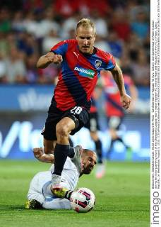 Gal Alberman of Maccabi Tel Aviv, bottom, and Daniel Kolar of Plzen in action during the third qualifying round of the Champions League return match between FC Viktoria Plzen and Maccabi Tel Aviv FC in Pilsen, Czech Republic, on Wednesday, August 5, 2015. (CTKxPhoto LadislavxAdamek) CTKPhotoF201508051023001 