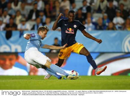 SOCCER - CL quali, Malmoe vs RBS MALMOE,SWEDEN,05.AUG.15 - UEFA Champions League, qualification, Malmoe FF vs Red Bull Salzburg. Image shows Kari Arnason (Malmoe) and Dimitri Oberlin (RBS). GEPAxpictures xFelixxRoittner
