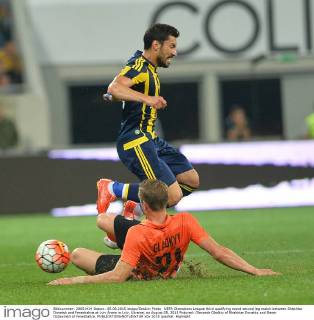 UEFA Champions League third qualifying round second leg match between Shakhtar Donetsk and Fenerbahce at Lviv Arena in Lviv, Ukraine, on August 05, 2015 Pictured: Olexandr Gladkiy of Shakhtar Donetks and Sener Ozbayrakli of Fenerbahce. 