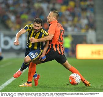 UEFA Champions League third qualifying round second leg match between Shakhtar Donetsk and Fenerbahce at Lviv Arena in Lviv, Ukraine, on August 05, 2015 Pictured: Vyacheslav Shevchuk (R) of Shakhtar Donetks and Sener Ozbayrakli (L) of Fenerbahce. 