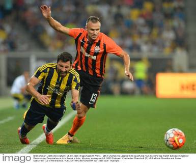 UEFA Champions League third qualifying round second leg match between Shakhtar Donetsk and Fenerbahce at Lviv Arena in Lviv, Ukraine, on August 05, 2015 Pictured: Vyacheslav Shevchuk (R) of Shakhtar Donetks and Sener Ozbayrakli (L) of Fenerbahce. 