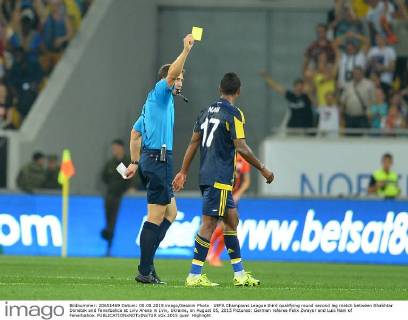 UEFA Champions League third qualifying round second leg match between Shakhtar Donetsk and Fenerbahce at Lviv Arena in Lviv, Ukraine, on August 05, 2015 Pictured: German referee Felix Zwayer and Luis Nani of Fenerbahce. 
