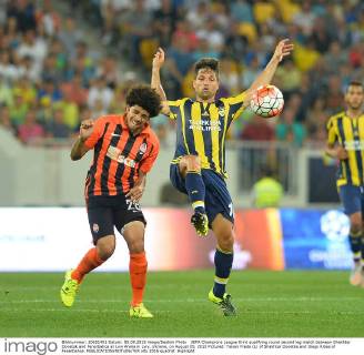 UEFA Champions League third qualifying round second leg match between Shakhtar Donetsk and Fenerbahce at Lviv Arena in Lviv, Ukraine, on August 05, 2015 Pictured: Taison Freda (L) of Shakhtar Donetks and Diego Ribas of Fenerbahce. 