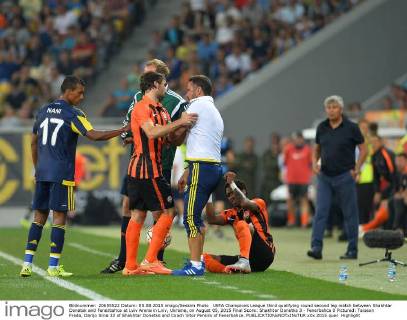 UEFA Champions League third qualifying round second leg match between Shakhtar Donetsk and Fenerbahce at Lviv Arena in Lviv, Ukraine, on August 05, 2015 Final Score: Shakhtar Donetks 3 - Fenerbahce 0 Pictured: Taiseon Freda, Darijo Srna 33 of Shakhtar Donetks and Coach Vitor Pereira of Fenerbahce. 