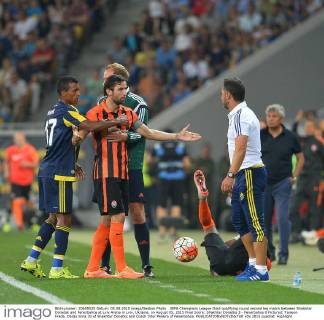 UEFA Champions League third qualifying round second leg match between Shakhtar Donetsk and Fenerbahce at Lviv Arena in Lviv, Ukraine, on August 05, 2015 Final Score: Shakhtar Donetks 3 - Fenerbahce 0 Pictured: Taiseon Freda, Darijo Srna 33 of Shakhtar Donetks and Coach Vitor Pereira of Fenerbahce. 
