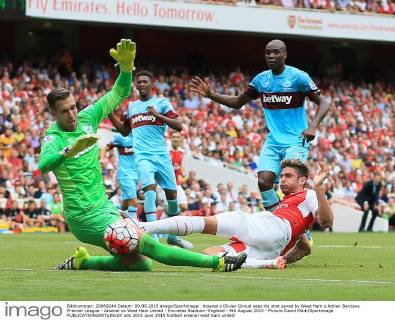 Arsenal s Olivier Giroud sees his shot saved by West Ham s Adrian Barclays Premier League - Arsenal vs West Ham United - Emirates Stadium -England - 9th August 2015 - Picture David Klein Sportimage EDITORIAL USE ONLY. No use with unauthorised audio, video, data, fixture lists, club league logos or live services. Online in-match use limited to 120 images, no video emulation. No use in betting, games or single club league player publications.