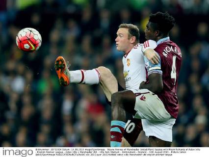 Wayne Rooney of Manchester United ManU tussles with Micah Richards of Aston Villa - English Premier League - Aston Villa v Manchester Utd - Villa Park Stadium - Birmingham - England - 14th August 2015 - Picture Simon Bellis Sportimage EDITORIAL USE ONLY. No use with unauthorised audio, video, data, fixture lists, club league logos or live services. Online in-match use limited to 120 images, no video emulation. No use in betting, games or single club league player publications.