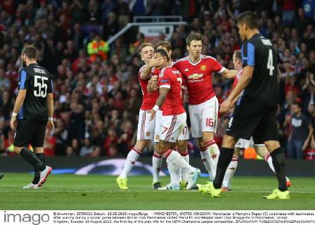 - MANCHESTER, UNITED KINGDOM: Manchester s Memphis Depay (C) celebrates with teammates after scoring during a soccer game between British club Manchester United ManU FC and Belgian team Club Brugge KV in Manchester, United Kingdom, Tuesday 18 August 2015, the first leg of the play-offs for the UEFA Champions League competition. BRUNOxFAHY  x04682695x