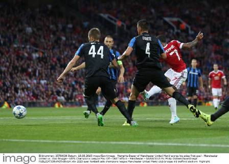 Memphis Depay of Manchester United ManU scores his sides first goal - Manchester United vs. Club Brugge - UEFA Champion s League Play Off - Old Trafford - Manchester - 18 08 2015 Pic Philip Oldham SportImage EDITORIAL USE ONLY. No use with unauthorised audio, video, data, fixture lists, club league logos or live services. Online in-match use limited to 120 images, no video emulation. No use in betting, games or single club league player publications.