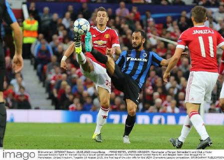 - MANCHESTER, UNITED KINGDOM: Manchester s Morgan Schneiderlin and Club s Victor Vazquez Solsona fight for the ball during a soccer game between British club Manchester United ManU FC and Belgian team Club Brugge KV in Manchester, United Kingdom, Tuesday 18 August 2015, the first leg of the play-offs for the UEFA Champions League competition. BRUNOxFAHY  x04682698x