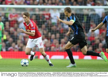 - MANCHESTER, UNITED KINGDOM: Manchester s Adnan Januzaj and Club s Timmy Simons fight for the ball during a soccer game between British club Manchester United ManU FC and Belgian team Club Brugge KV in Manchester, United Kingdom, Tuesday 18 August 2015, the first leg of the play-offs for the UEFA Champions League competition. BRUNOxFAHY  x04682699x