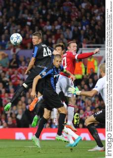 - MANCHESTER, UNITED KINGDOM: Club s Brandon Mechele, Club s Timmy Simons and Manchester s Wayne Rooney fight for the ball during a soccer game between British club Manchester United ManU FC and Belgian team Club Brugge KV in Manchester, United Kingdom, Tuesday 18 August 2015, the first leg of the play-offs for the UEFA Champions League competition. BRUNOxFAHY x04682702x