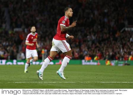 Memphis Depay of Manchester United ManU celebrates his second goal - Manchester United vs. Club Brugge - UEFA Champion s League Play Off - Old Trafford - Manchester - 18 08 2015 Pic Philip Oldham SportImage EDITORIAL USE ONLY. No use with unauthorised audio, video, data, fixture lists, club league logos or live services. Online in-match use limited to 120 images, no video emulation. No use in betting, games or single club league player publications.