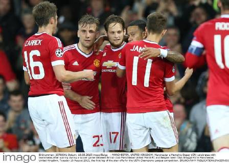 - MANCHESTER, UNITED KINGDOM: Manchester s Memphis Depay (CR) celebrates with teammates after scoring during a soccer game between British club Manchester United ManU FC and Belgian team Club Brugge KV in Manchester, United Kingdom, Tuesday 18 August 2015, the first leg of the play-offs for the UEFA Champions League competition. BRUNOxFAHY  x04682727x
