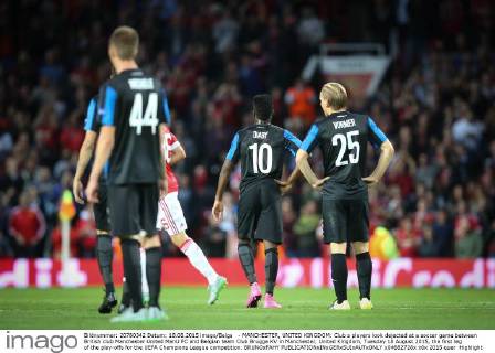 - MANCHESTER, UNITED KINGDOM: Club s players look dejected at a soccer game between British club Manchester United ManU FC and Belgian team Club Brugge KV in Manchester, United Kingdom, Tuesday 18 August 2015, the first leg of the play-offs for the UEFA Champions League competition. BRUNOxFAHY  x04682728x