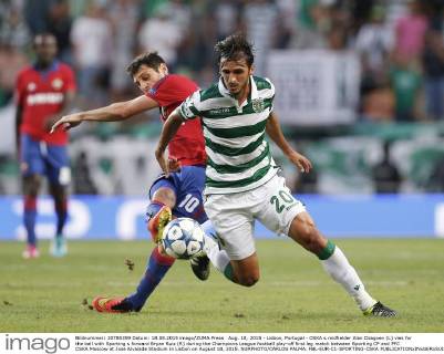 Aug. 18, 2015 - Lisbon, Portugal - CSKA s midfielder Alan Dzagoev (L) vies for the ball with Sporting s forward Bryan Ruiz (R) during the Champions League football play-off first leg match between Sporting CP and PFC CSKA Moscow at Jose Alvalade Stadium in Lisbon on August 18, 2015. NURPHOTO CARLOS PALMA. FBL-EUR-C1-SPORTING-CSKA  - ZUMAn230