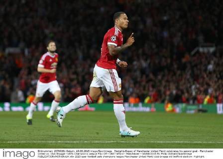 Memphis Depay of Manchester United ManU celebrates his second goal - Manchester United vs. Club Brugge - UEFA Champion s League Play Off - Old Trafford - Manchester - 18 08 2015 Pic Philip Oldham SportImage EDITORIAL USE ONLY. No use with unauthorised audio, video, data, fixture lists, club league logos or live services. Online in-match use limited to 120 images, no video emulation. No use in betting, games or single club league player publications.