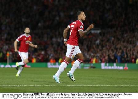 Memphis Depay of Manchester United ManU celebrates his second goal - Manchester United vs. Club Brugge - UEFA Champion s League Play Off - Old Trafford - Manchester - 18 08 2015 Pic Philip Oldham SportImage EDITORIAL USE ONLY. No use with unauthorised audio, video, data, fixture lists, club league logos or live services. Online in-match use limited to 120 images, no video emulation. No use in betting, games or single club league player publications.