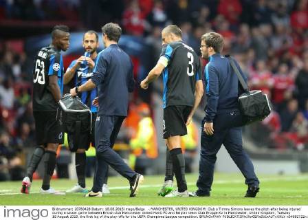 - MANCHESTER, UNITED KINGDOM: Club s Timmy Simons leaves the pitch after being injured during a soccer game between British club Manchester United ManU FC and Belgian team Club Brugge KV in Manchester, United Kingdom, Tuesday 18 August 2015, the first leg of the play-offs for the UEFA Champions League competition. BRUNOxFAHY x04682722x