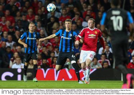 - MANCHESTER, UNITED KINGDOM: Club s Brandon Mechele and Manchester s Wayne Rooney fight for the ball during a soccer game between British club Manchester United ManU FC and Belgian team Club Brugge KV in Manchester, United Kingdom, Tuesday 18 August 2015, the first leg of the play-offs for the UEFA Champions League competition. BRUNOxFAHY x04682735x
