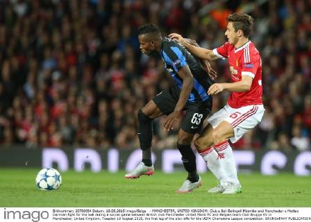 - MANCHESTER, UNITED KINGDOM: Club s Boli Bolingoli Mbombo and Manchester s Matteo Darmian fight for the ball during a soccer game between British club Manchester United ManU FC and Belgian team Club Brugge KV in Manchester, United Kingdom, Tuesday 18 August 2015, the first leg of the play-offs for the UEFA Champions League competition. BRUNOxFAHY  x04682736x