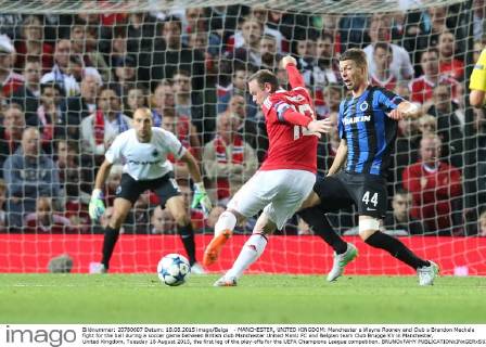 - MANCHESTER, UNITED KINGDOM: Manchester s Wayne Rooney and Club s Brandon Mechele fight for the ball during a soccer game between British club Manchester United ManU FC and Belgian team Club Brugge KV in Manchester, United Kingdom, Tuesday 18 August 2015, the first leg of the play-offs for the UEFA Champions League competition. BRUNOxFAHY  x04682742x