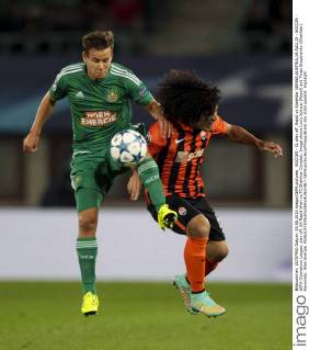 SOCCER - CL play off, Rapid vs Shakhtar VIENNA,AUSTRIA,19.AUG.15 - SOCCER - UEFA Champions League, play off, SK Rapid Wien vs FC Shakhtar Donetsk. Image shows Louis Schaub (Rapid) and Taras Stepanenko (Shakhtar). Keywords: Wien Energie. GEPAxpictures xPhilippxBrem