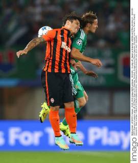 SOCCER - CL play off, Rapid vs Shakhtar VIENNA,AUSTRIA,19.AUG.15 - SOCCER - UEFA Champions League, play off, SK Rapid Wien vs FC Shakhtar Donetsk. Image shows Marcio Azevedo (Donetsk) and Mario Pavelic (Rapid). Keywords: Wien Energie. GEPAxpictures xChristianxOrt