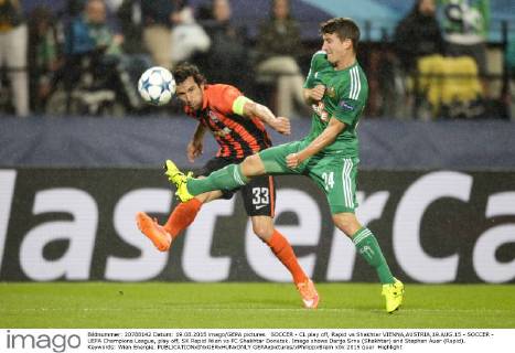 SOCCER - CL play off, Rapid vs Shakhtar VIENNA,AUSTRIA,19.AUG.15 - SOCCER - UEFA Champions League, play off, SK Rapid Wien vs FC Shakhtar Donetsk. Image shows Darijo Srna (Shakhtar) and Stephan Auer (Rapid). Keywords: Wien Energie. GEPAxpictures xPhilippxBrem