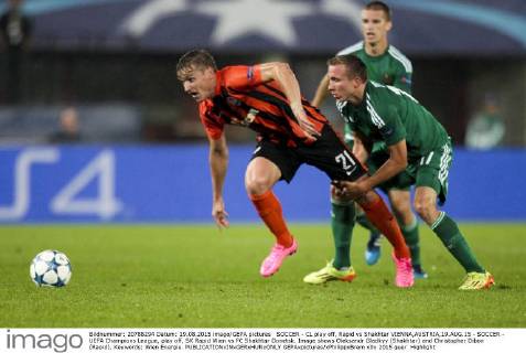 SOCCER - CL play off, Rapid vs Shakhtar VIENNA,AUSTRIA,19.AUG.15 - SOCCER - UEFA Champions League, play off, SK Rapid Wien vs FC Shakhtar Donetsk. Image shows Oleksandr Gladkyy (Shakhtar) and Christopher Dibon (Rapid). Keywords: Wien Energie. GEPAxpictures xPhilippxBrem