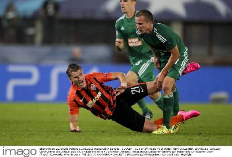 SOCCER - CL play off, Rapid vs Shakhtar VIENNA,AUSTRIA,19.AUG.15 - SOCCER - UEFA Champions League, play off, SK Rapid Wien vs FC Shakhtar Donetsk. Image shows Oleksandr Gladkyy (Shakhtar) and Christopher Dibon (Rapid). Keywords: Wien Energie. GEPAxpictures xPhilippxBrem