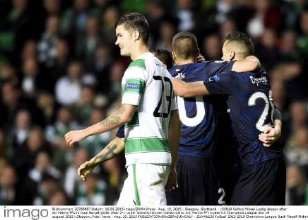 Aug. 19, 2015 - Glasgow, Skottland - 150819 Celtics Mikael Lustig deppar efter att Malmö FFs Jo Inge Berget jublar efter 2-1 under fotbollsmatchen mellan Celtic och Malmö FF i kvalet till Champions League den 19 augusti 2015 i Glasgow..Foto: News - Aug. 19, 2015 - ZUMAb138