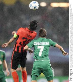 SOCCER - CL play off, Rapid vs Shakhtar VIENNA,AUSTRIA,19.AUG.15 - SOCCER - UEFA Champions League, play off, SK Rapid Wien vs FC Shakhtar Donetsk. Image shows Darijo Srna (Shakhtar) and Philipp Schobesberger (Rapid). Keywords: Wien Energie. GEPAxpictures xPhilippxBrem