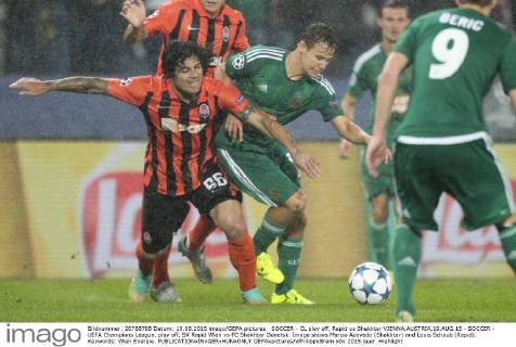 SOCCER - CL play off, Rapid vs Shakhtar VIENNA,AUSTRIA,19.AUG.15 - SOCCER - UEFA Champions League, play off, SK Rapid Wien vs FC Shakhtar Donetsk. Image shows Marcio Azevedo (Shakhtar) and Louis Schaub (Rapid). Keywords: Wien Energie. GEPAxpictures xPhilippxBrem