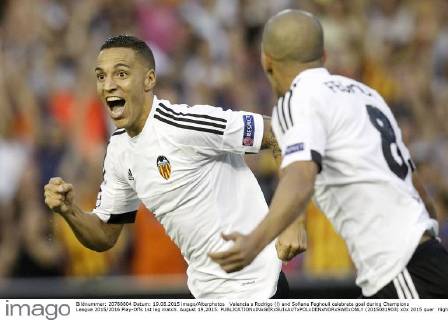 Valencia s Rodrigo (l) and Sofiane Feghouli celebrate goal during Champions League 2015 2016 Play-Offs 1st leg match. August 19,2015. (2015081903)