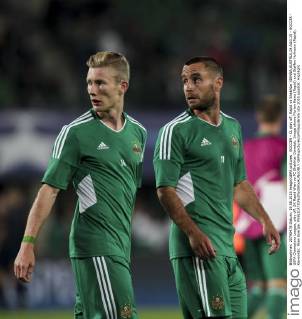 SOCCER - CL play off, Rapid vs Shakhtar VIENNA,AUSTRIA,19.AUG.15 - SOCCER - UEFA Champions League, play off, SK Rapid Wien vs FC Shakhtar Donetsk. Image shows Florian Kainz (Rapid) and Steffen Hofmann (Rapid). Keywords: Wien Energie. GEPAxpictures xPhilippxBrem