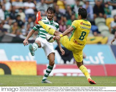 Aug. 22, 2015 - Lisbon, Portugal - Sporting s midfielder Alberto Aquilani (L) vies for the ball with Pacos Ferreira s midfielder Christian (R) during the Portuguese League football match between Sporting CP and FC Pacos de Ferreira at Jose Alvalade Stadium in Lisbon on August 22, 2015. NURPHOTO CARLOS PALMA. FBL-LIGA-POR-SPORTING-PACOS - ZUMAn230