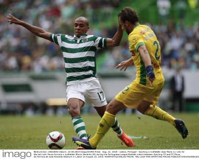 Aug. 22, 2015 - Lisbon, Portugal - Sporting s midfielder Joao Mario (L) vies for the ball with Pacos Ferreira s midfielder Marco Baixinho (R) during the Portuguese League football match between Sporting CP and FC Pacos de Ferreira at Jose Alvalade Stadium in Lisbon on August 22, 2015. NURPHOTO CARLOS PALMA. FBL-LIGA-POR-SPORTING-PACOS - ZUMAn230