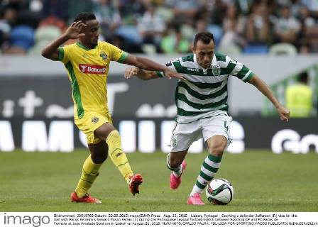 Aug. 22, 2015 - Lisbon, Portugal - Sporting s defender Jefferson (R) vies for the ball with Pacos Ferreira s forward Edson Farias (L) during the Portuguese League football match between Sporting CP and FC Pacos de Ferreira at Jose Alvalade Stadium in Lisbon on August 22, 2015. NURPHOTO CARLOS PALMA. FBL-LIGA-POR-SPORTING-PACOS - ZUMAn230