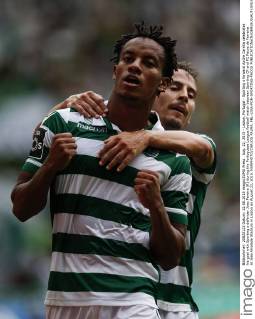 Aug. 22, 2015 - Lisbon, Portugal - Sporting s forward Andre Carrillo celebrates his goal with Sporting s defender Joao Pereira (R) during the Portuguese League football match between Sporting CP and FC Pacos de Ferreira at Jose Alvalade Stadium in Lisbon on August 22, 2015. NURPHOTO CARLOS PALMA. FBL-LIGA-POR-SPORTING-PACOS - ZUMAn230