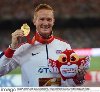 (150826) -- BEIJING, Aug. 26, 2015 -- Gold medalist Britain s Greg Rutherford celebrates during the awarding ceremony of men s long jump at the 2015 IAAF World Championships at the Bird s Nest National Stadium in Beijing, capital of China, Aug. 26, 2015. ) (SP)CHINA-BEIJING-IAAF WORLD CHAMPIONSHIPS-MEN S LONG JUMP AWARDING CEREMONY (CN) WangxHaofei 
