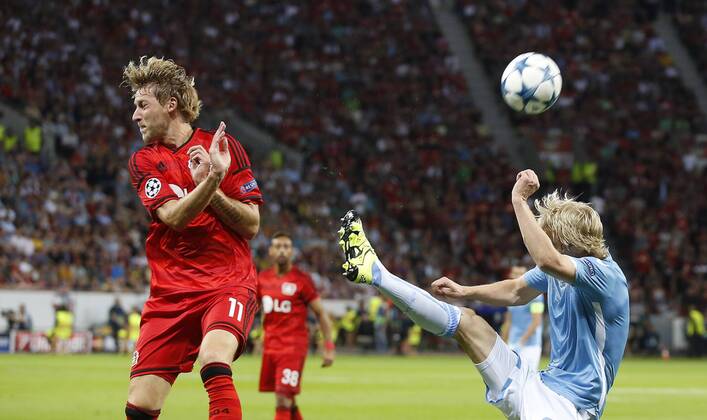 Stefan Kießling (Bayer 04 Leverkusen) (L) against Dusan Basta (Lazio Rom) during the Championsleague Qualification between Bayer 04 Leverkusen and Lazio Rom, Bayarena in Leverkusen on August 26., 2015. Bayer 04 Leverkusen vs. Lazi Rom in der Qualifikation der Champions League der Saison 2015 2016 am 26. August 2015.