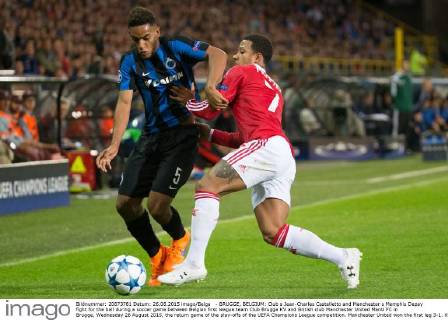 - BRUGGE, BELGIUM: Club s Jean-Charles Castelletto and Manchester s Memphis Depay fight for the ball during a soccer game between Belgian first league team Club Brugge KV and British club Manchester United ManU FC in Brugge, Wednesday 26 August 2015, the return game of the play-offs of the UEFA Champions League competition. Manchester United won the first leg 3-1. KURTxDESPLENTER x04687483x