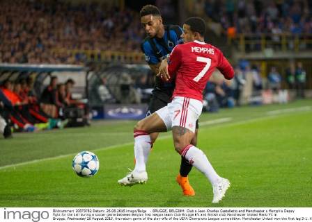 - BRUGGE, BELGIUM: Club s Jean-Charles Castelletto and Manchester s Memphis Depay fight for the ball during a soccer game between Belgian first league team Club Brugge KV and British club Manchester United ManU FC in Brugge, Wednesday 26 August 2015, the return game of the play-offs of the UEFA Champions League competition. Manchester United won the first leg 3-1. KURTxDESPLENTER x04687485x