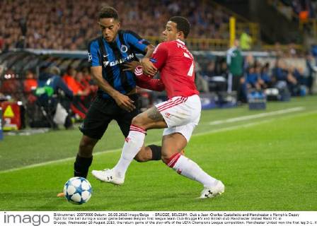 - BRUGGE, BELGIUM: Club s Jean-Charles Castelletto and Manchester s Memphis Depay fight for the ball during a soccer game between Belgian first league team Club Brugge KV and British club Manchester United ManU FC in Brugge, Wednesday 26 August 2015, the return game of the play-offs of the UEFA Champions League competition. Manchester United won the first leg 3-1. KURTxDESPLENTER x04687484x