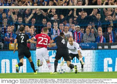 - BRUGGE, BELGIUM: Manchester s Luke Shaw and Club s goalkeeper Sinan Bolat fight for the ball during a soccer game between Belgian first league team Club Brugge KV and British club Manchester United ManU FC in Brugge, Wednesday 26 August 2015, the return game of the play-offs of the UEFA Champions League competition. Manchester United won the first leg 3-1. KURTxDESPLENTER  x04687496x