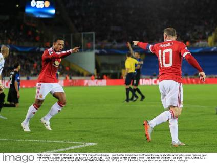 Manchester United ManU s Wayne Rooney celebrates scoring his sides opening goal with Memphis Depay Champions League Play-Off 2nd Leg - Club Brugge vs Manchester United - Jan Breydel Stadium - Belgium - 26th August 2015 - Picture David Klein Sportimage EDITORIAL USE ONLY. No use with unauthorised audio, video, data, fixture lists, club league logos or live services. Online in-match use limited to 120 images, no video emulation. No use in betting, games or single club league player publications.