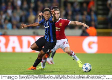 - BRUGGE, BELGIUM: Club s Jean-Charles Castelletto and Manchester s Luke Shaw fight for the ball during a soccer game between Belgian first league team Club Brugge KV and British club Manchester United ManU FC in Brugge, Wednesday 26 August 2015, the return game of the play-offs of the UEFA Champions League competition. Manchester United won the first leg 3-1. BRUNOxFAHY x04687566x
